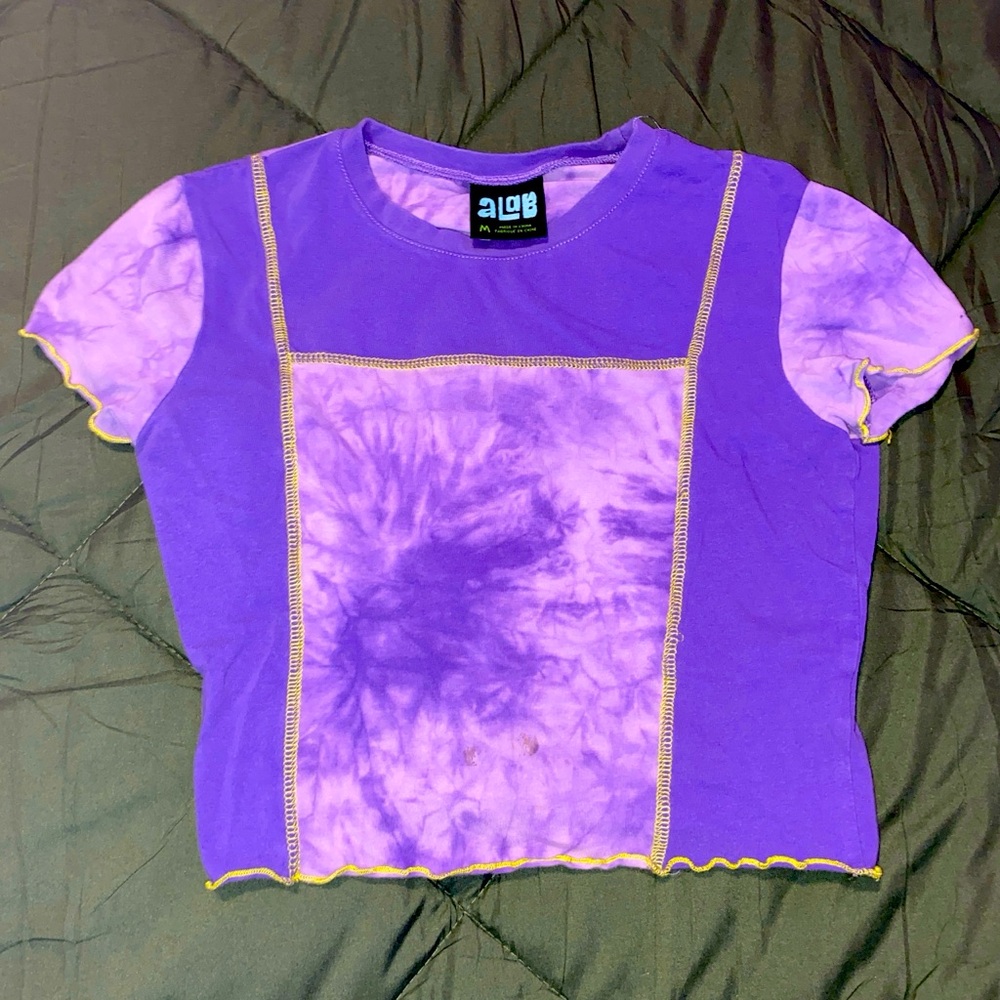 purple and yellow tie dye crop top with contrast stitching